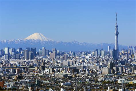 豊島区 天気 1時間 雨が降る前に傘を買うべきか、それともただの空模様か